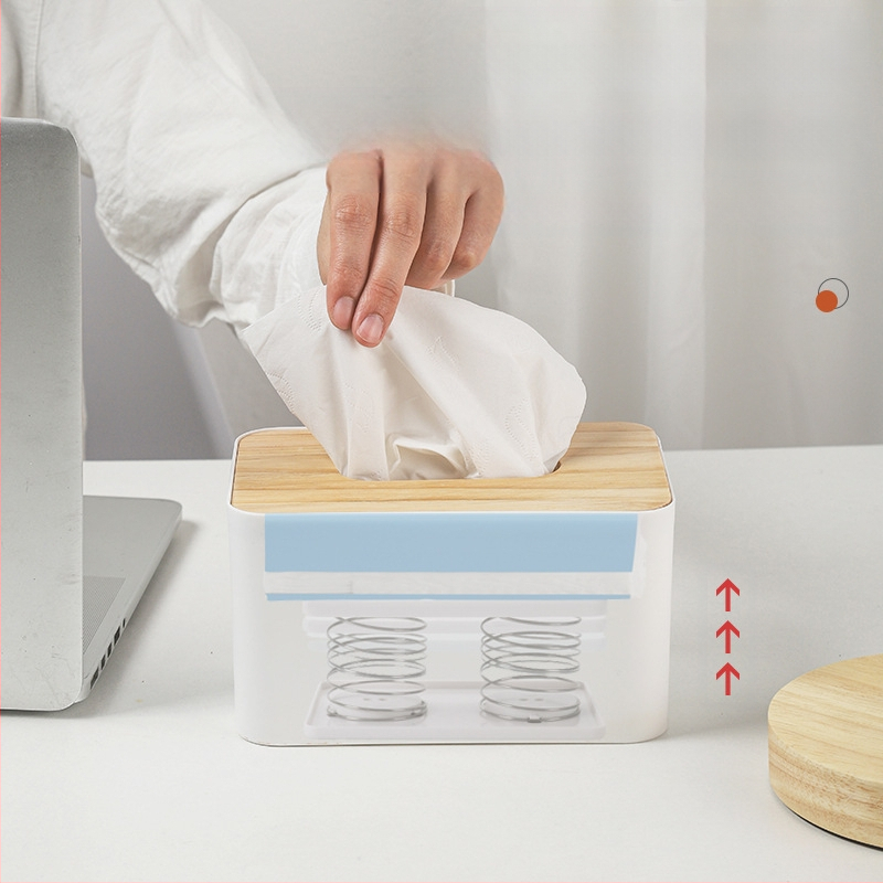 Pakeliama servetėlių dėžutės spyruoklinė atrama, skirta pritraukti prie apatinės spyruoklinės stalčiaus dėžutės apatinės atramos, laikymo dėžutės spyruoklinė lapo pakėlimo elastinė atrama