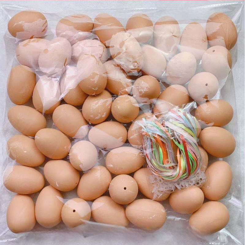 50 tükki valgeid värvilisi kunstmune, plastmassist munakoored, lasteaia käsitööna valminud graffiti lihavõttemunad