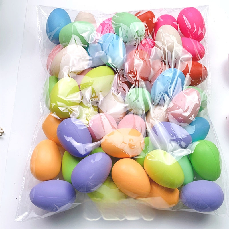 50 tükki valgeid värvilisi kunstmune, plastmassist munakoored, lasteaia käsitööna valminud graffiti lihavõttemunad