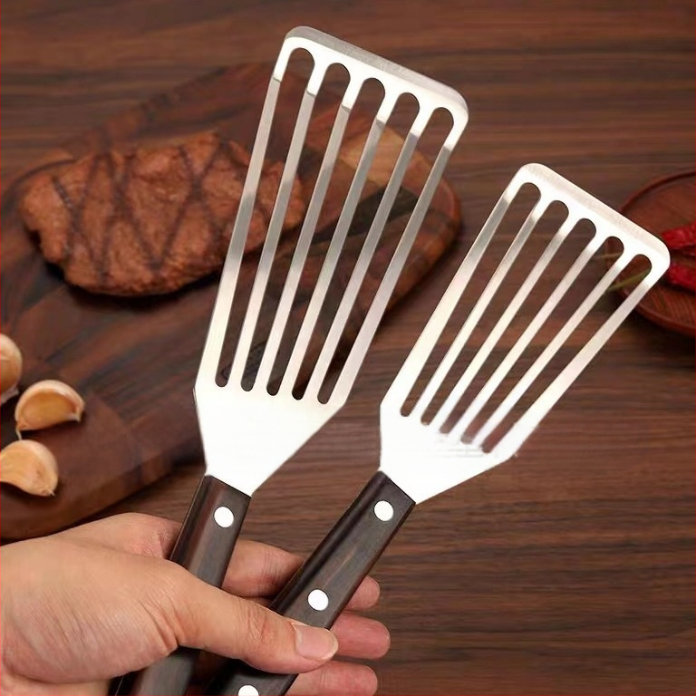 Nerūdijančio plieno keptos žuvies kastuvas kepsnių puodui kastuvas buitinis keptas keptas išsiliejęs kastuvas medinė rankena plastikinis kepimo kastuvas kepimo kastuvas virtuvės įrankiai