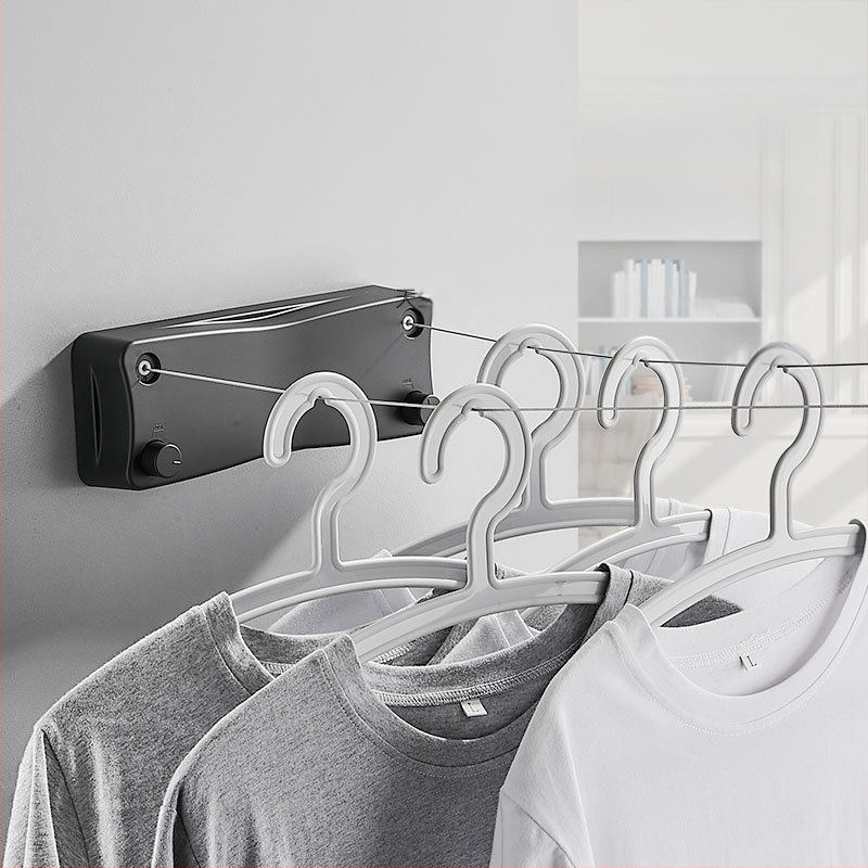 Modernus paprastas stilius nematomas drabužių stovas bendrabutyje be skylių montavimas ABS medžiagos ištraukiama drabužių linija