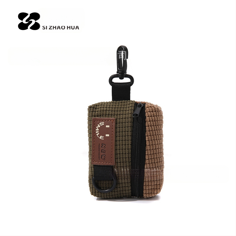 Mini mündikott Trendikas brändi väike kott ripatsiga rõivaaksessuaarid rippuv kõrvaklappide kott kaasaskantav hoiustusvõtmekott mündile