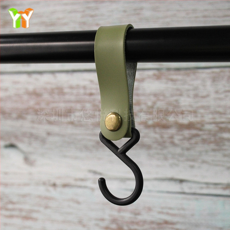 Laos S-tüüpi nahkkonks, õues kasutamiseks mõeldud telk, kaelarihmaga hoiukonks, koduköögi lauanõude organiseerimiskonks