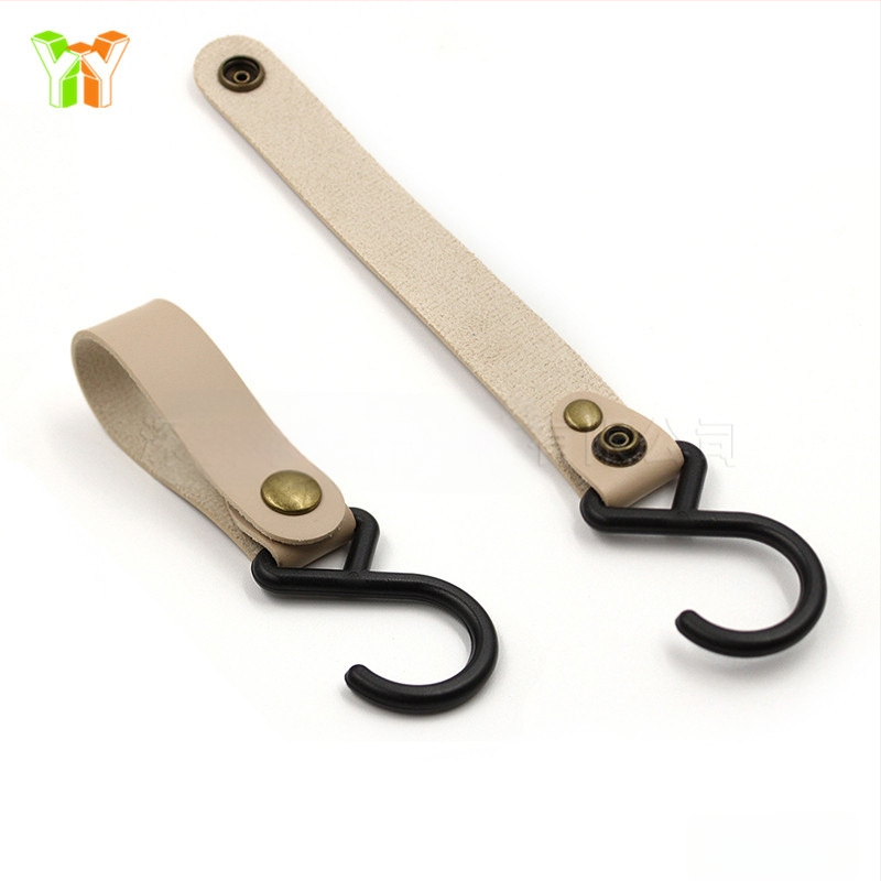 Laos S-tüüpi nahkkonks, õues kasutamiseks mõeldud telk, kaelarihmaga hoiukonks, koduköögi lauanõude organiseerimiskonks