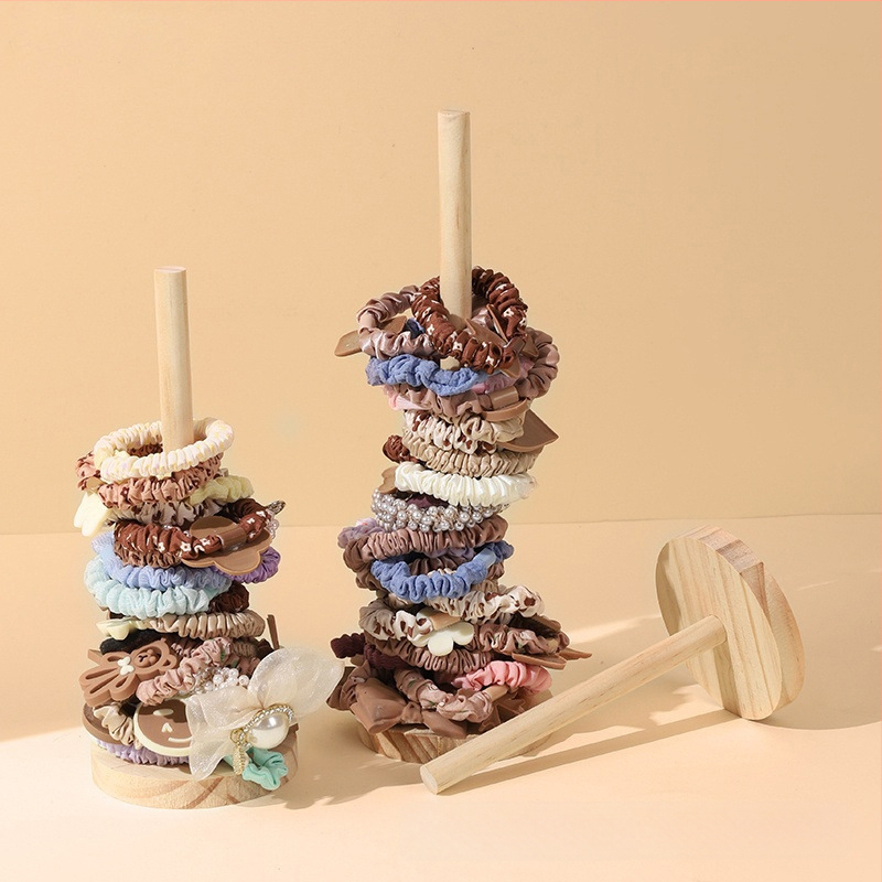 Kūrybingas medžio masyvo galvos virvės laikymo stovas, plaukų virvė, plaukų gėlių stovas, galvos apyrankė, apyrankės demonstravimo rekvizitų stovas