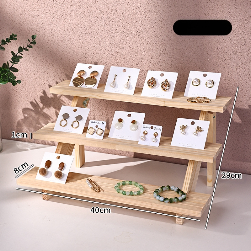 Papuošalų demonstravimo lentyna, medžio masyvo stalviršis, auskarai, papuošalų laikymo lentyna, papuošalų apyrankės, auskarų prekystalis su laiptuotu demonstravimu