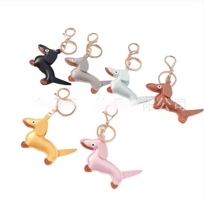 Határokon átnyúló Amazon új PU tacskó kutya kulcstartó kézi kötél táska függő baba kézitáska dekoratív bőr medál Tide