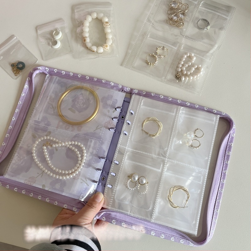 Väike lilleline lukuga raamat, oksüdatsioonivastased kõrvarõngad, kaelakeed, kõrvarõngad, kõrvarõngad, ehted, käeaksessuaarid, suletud kotid, hoiuraamatud, ehete hoiustamine