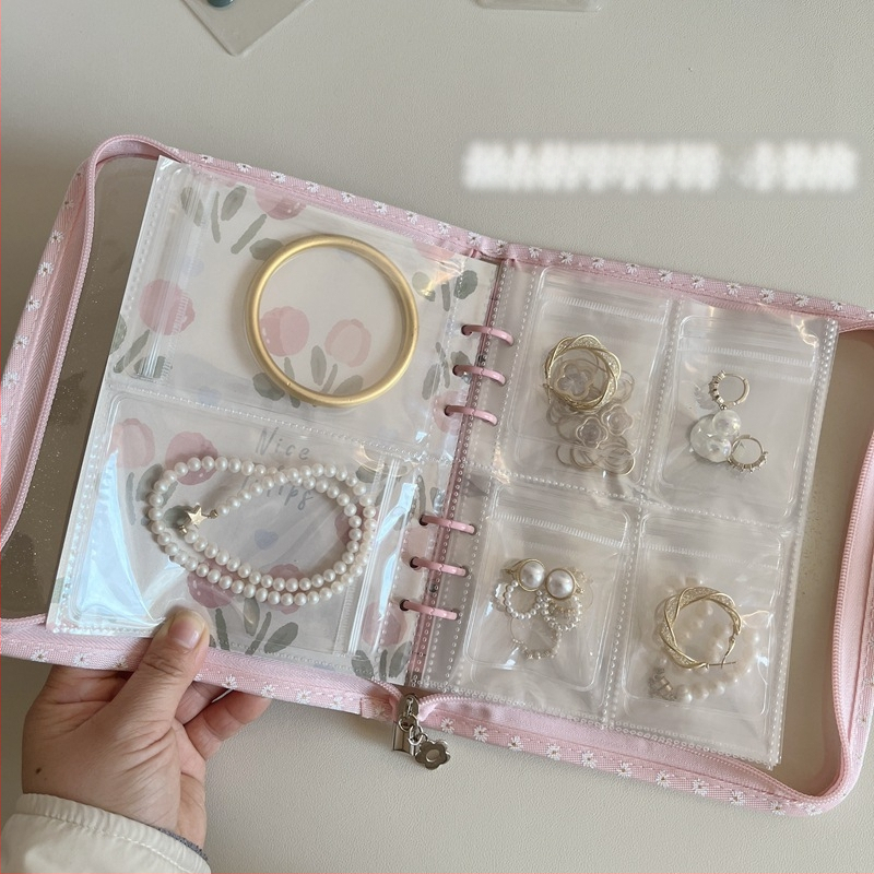 Väike lilleline lukuga raamat, oksüdatsioonivastased kõrvarõngad, kaelakeed, kõrvarõngad, kõrvarõngad, ehted, käeaksessuaarid, suletud kotid, hoiuraamatud, ehete hoiustamine