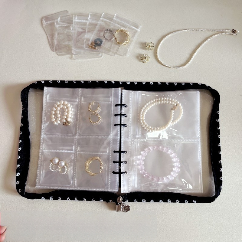 Väike lilleline lukuga raamat, oksüdatsioonivastased kõrvarõngad, kaelakeed, kõrvarõngad, kõrvarõngad, ehted, käeaksessuaarid, suletud kotid, hoiuraamatud, ehete hoiustamine