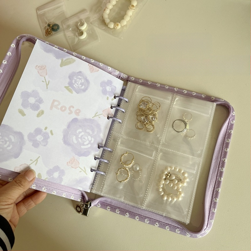 Väike lilleline lukuga raamat, oksüdatsioonivastased kõrvarõngad, kaelakeed, kõrvarõngad, kõrvarõngad, ehted, käeaksessuaarid, suletud kotid, hoiuraamatud, ehete hoiustamine