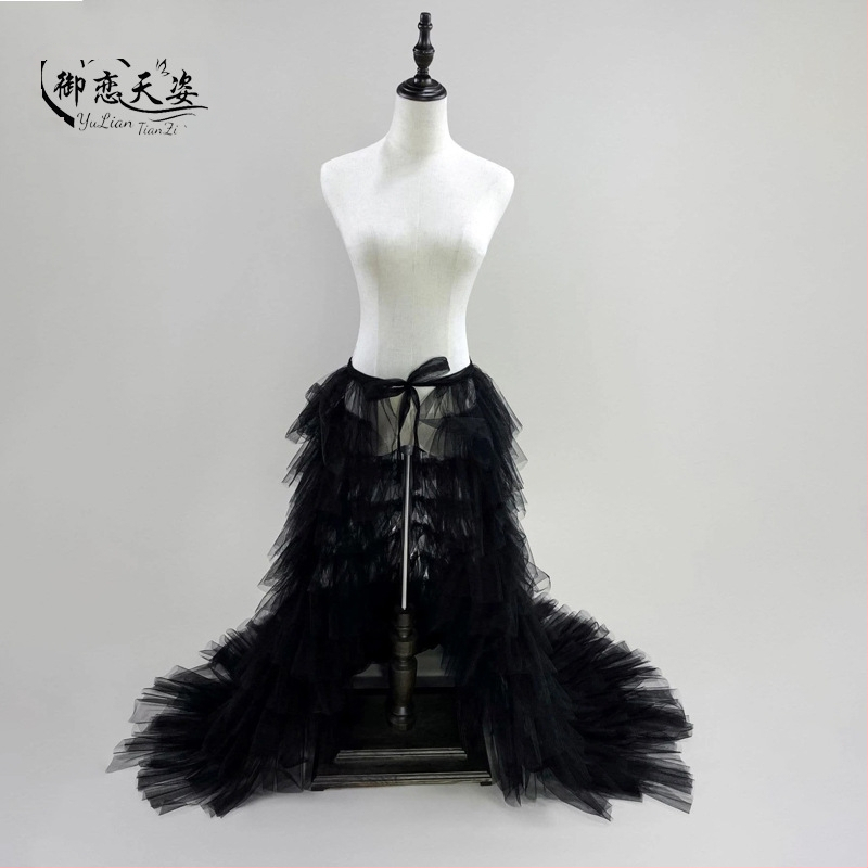 Eiropas un Amerikas pārrobežu garie sieta šūšanas kūkas svārki ar seksīgu, universālu mežģīņu augstu jostasvietu un krokotu tutu svārkiem