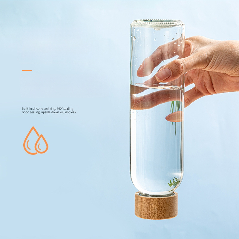 Υψηλής ποιότητας βοριοπυριτικό μπαμπού καπάκι κορδόνι γυάλινο αθλητικό μπουκάλι νερό μονής στρώσης γυάλινο φορητό δημιουργικό ποτήρι ανάπηρου κυλινδρικό ποτήρι νερού