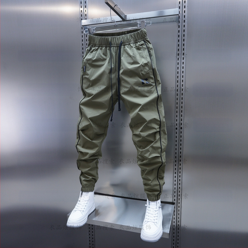Tavaszi és őszi új férfi lezser nadrág koreai stílusú, gyorsan száradó, laza szárú, divatos, egyszínű, minden lábra illeszkedő nadrág