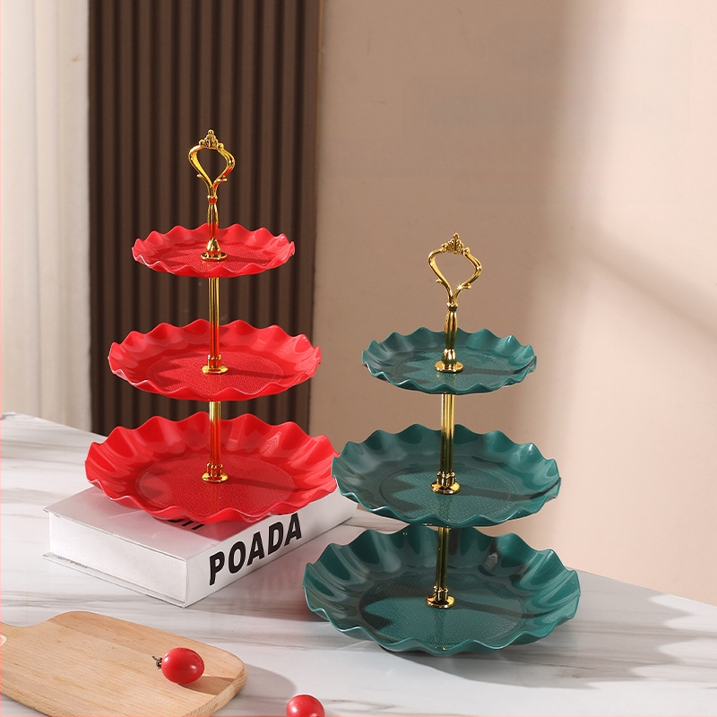 Daugiasluoksnė vaisių lėkštė, pasižyminti aukšta estetine verte, lengvu prabangumu ir aukšto lygio pojūčiu, tinkanti svetainės kavos staliukui, užkandžių lėkštei, džiovintų vaisių demonstravimo lėkštei ir padalintai lėkštei.