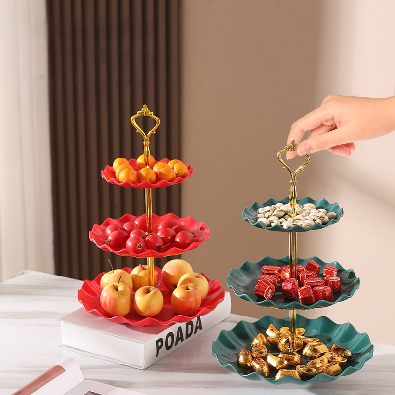 Daugiasluoksnė vaisių lėkštė, pasižyminti aukšta estetine verte, lengvu prabangumu ir aukšto lygio pojūčiu, tinkanti svetainės kavos staliukui, užkandžių lėkštei, džiovintų vaisių demonstravimo lėkštei ir padalintai lėkštei.