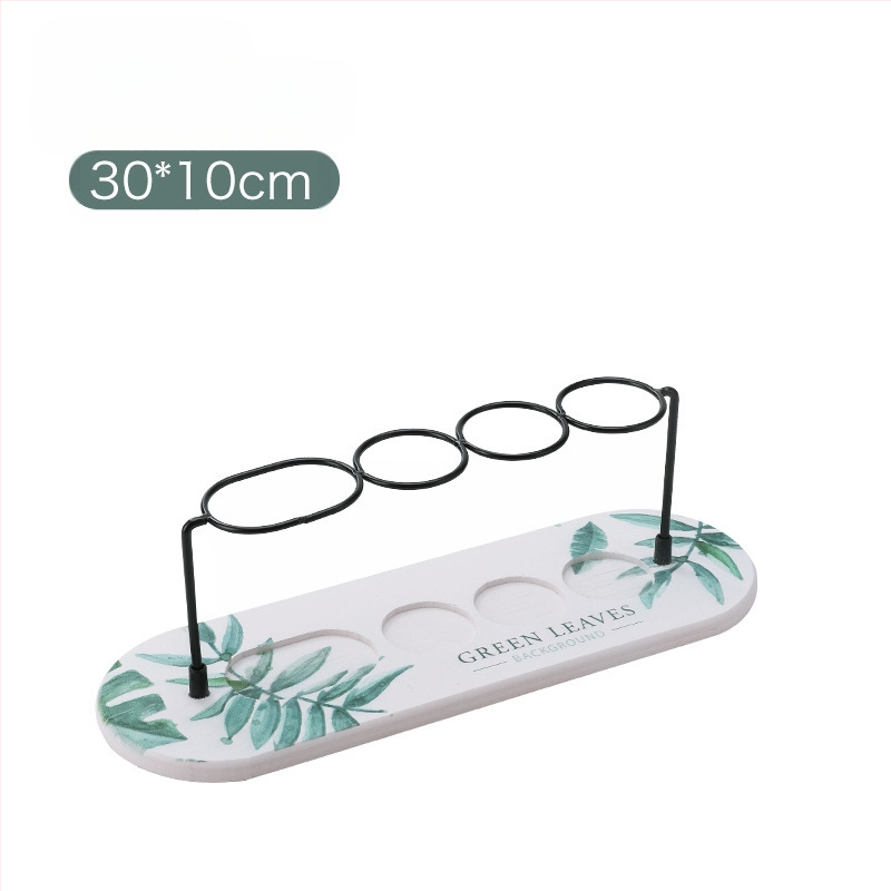 Tarpvalstybinis diatomų purvo džiovinimo kilimėlis, elektrinis dantų šepetėlių stovas, vandeniui atsparus tualeto kilimėlis, padėkliukas, praustuvo sugeriamasis kilimėlis