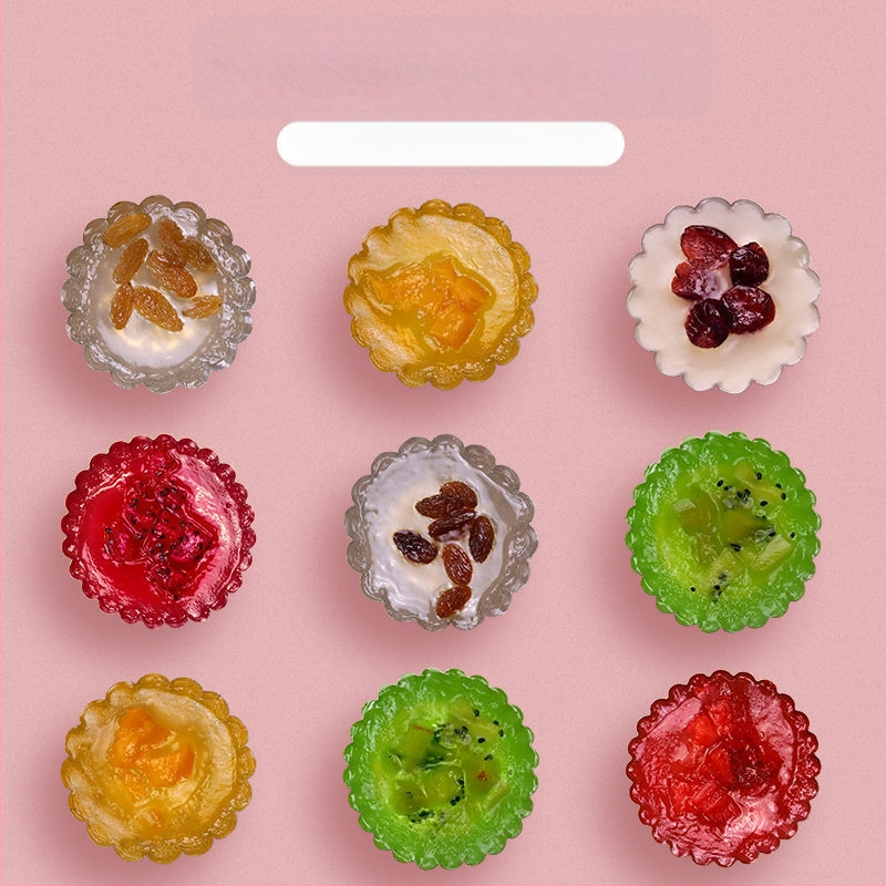 Ühekordselt kasutatav krüsanteemikoogi vorm, ümmargune plekkfooliumist tass, munakoogipuding, hobuserauakujuline koogisupi täidisekott, plekk-paberikauss