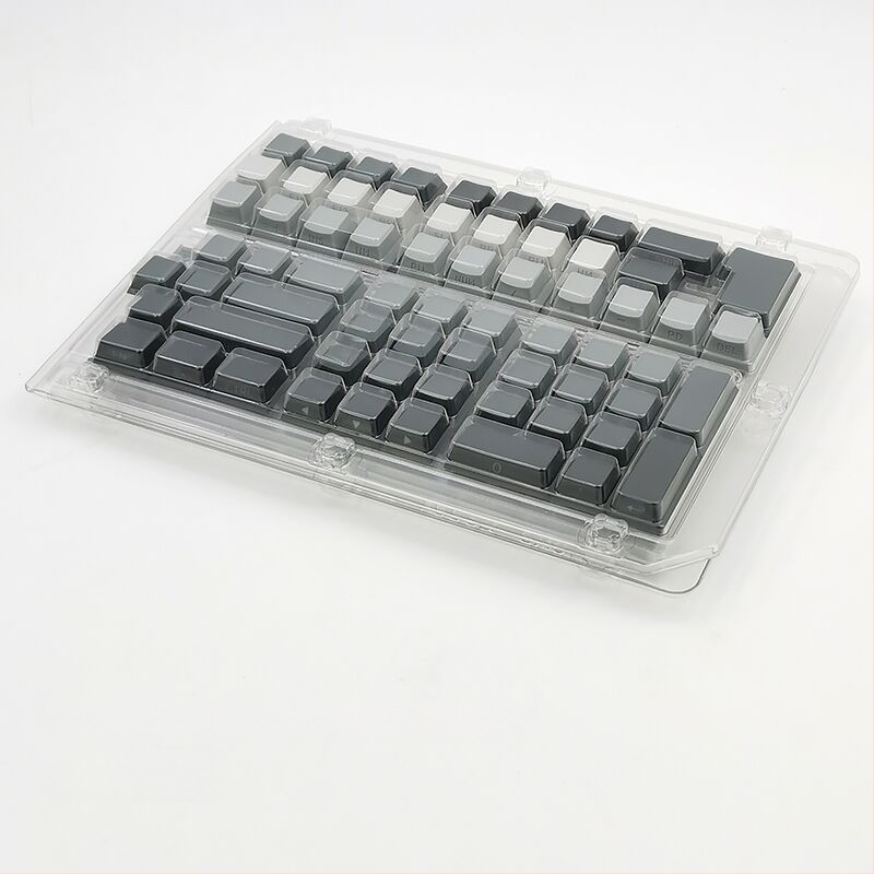 Didmeninė prekyba tarpvalstybiniu, ekstremalios dienos pusėje graviruotu, mažu, pilnu 133 raktų PBT dviejų spalvų įpurškimo, pritaikyto originalaus aukščio, rinkiniu.