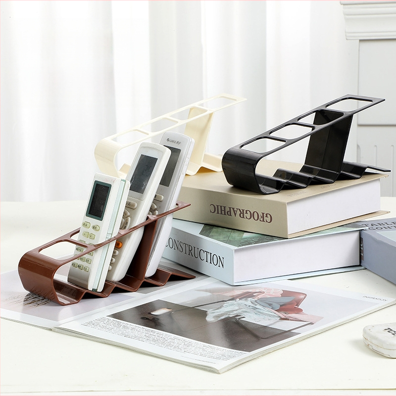 Határokon átnyúló új, többfunkciós tárolóállvány, műanyag távirányítós tárolóállvány, háztartási asztali dohányzóasztal tárolóállvány