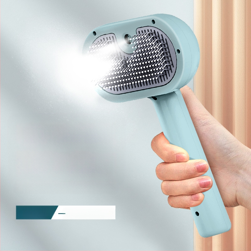 Гребен за домашни любимци със спрей Гребен за котки Гребен за кучета Гребен за домашни любимци Гребен за обезкосмяване с един бутон, който се носи по течението Консумативи за домашни любимци