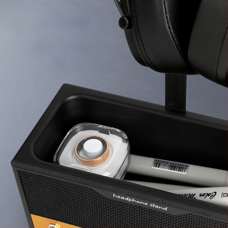 2025. aasta uus retrokõlarite kõrvaklappide vitriinlauale mõeldud hoiukarbi rokkstiilis pliiatsihoidja saab märgistada