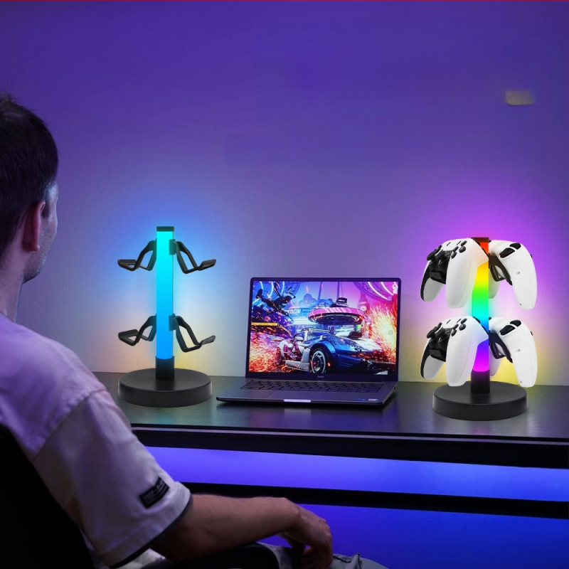 Pārrobežu tirgū pieprasīts RGB spēļu kontroliera statīvs, austiņu statīvs, apkārtējās vides apgaismojums, e-sporta ritma apgaismojums, galda lampa, naktslampiņa