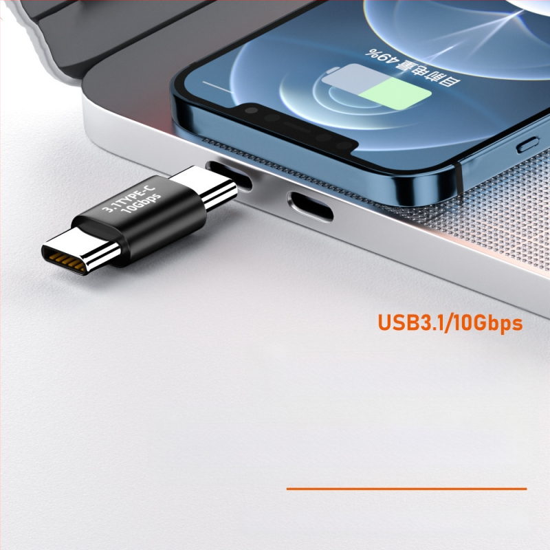 USB-C tipo jungties adapteris, jungiantis laikiklį prie TPC tipo jungties, 3.1 lizdo ir 2.0 jungties, 10 GB jungties, 3.1 lizdo ir 2.0 jungties, 10 GB jungties.