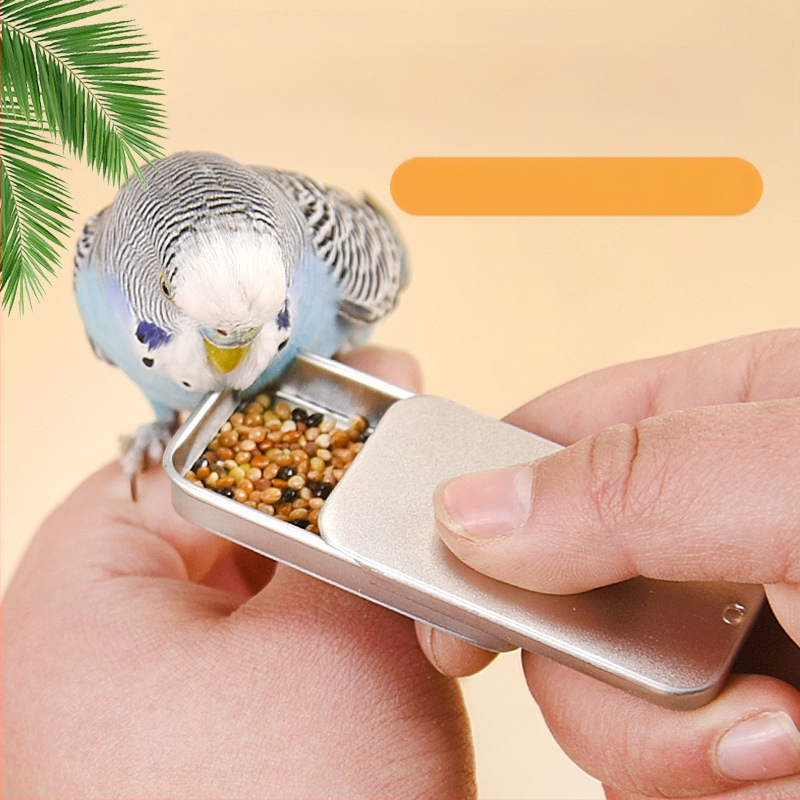 Papagoi treeninglindude spetsiaalne tõukamisega toidukast tiigri nahast pojengi Xuanfengi treeningtoidupott suurele vennale kaasaskantav toidukast linnutarbed