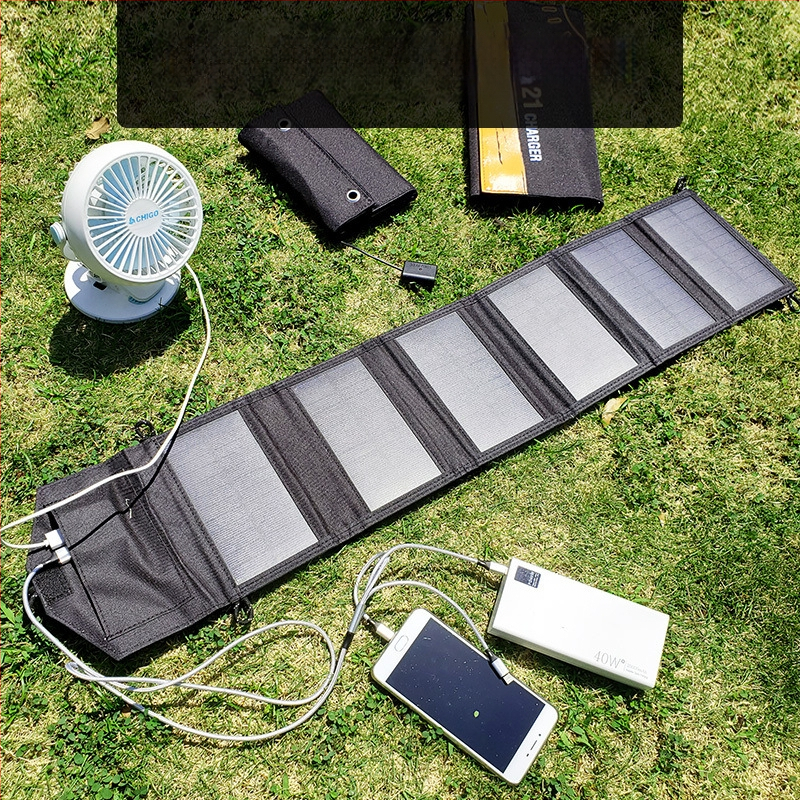Monokristallilise räni päikeselaadimisplaat reguleeritud välistingimustes kasutatava kaasaskantava kokkupandava mobiiltelefoni laadimise aare kiire laadimisega fotogalvaaniline aku