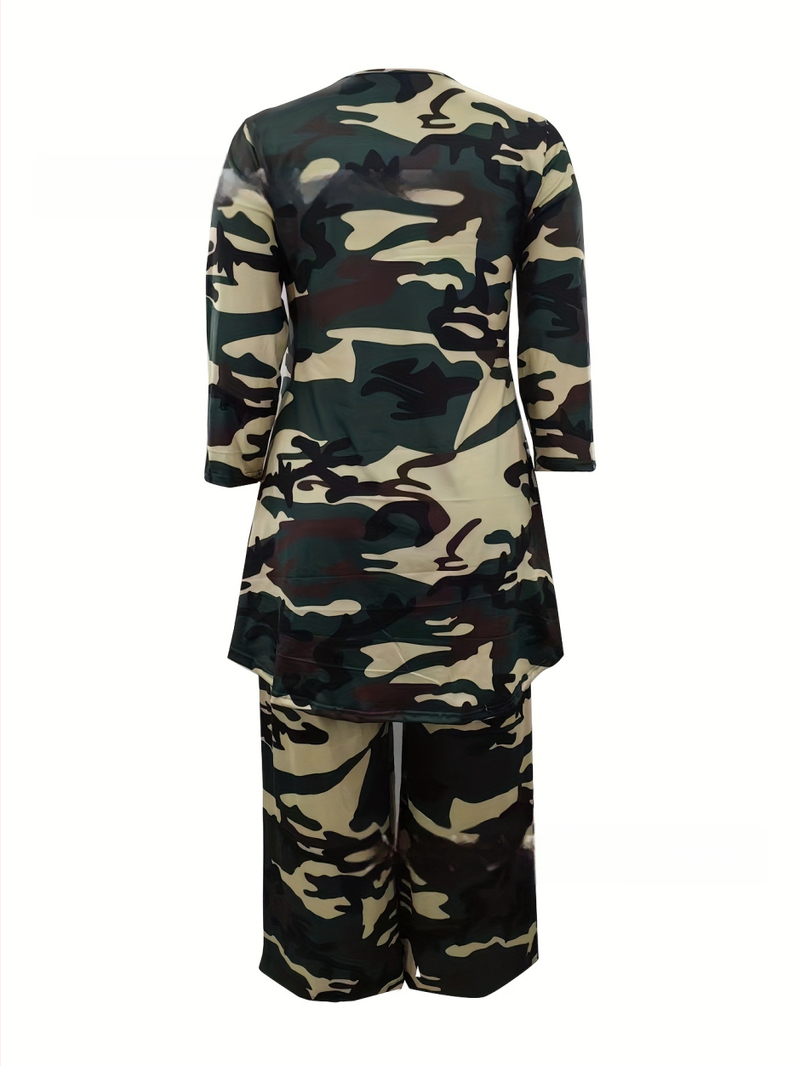 Naiste pluss-suuruses vabaaja ülikond, pluss-suuruses lühike eest ja pikk tagant asümmeetriline ümara kaelusega topp ja lahtised püksid, kaheosaline komplekt