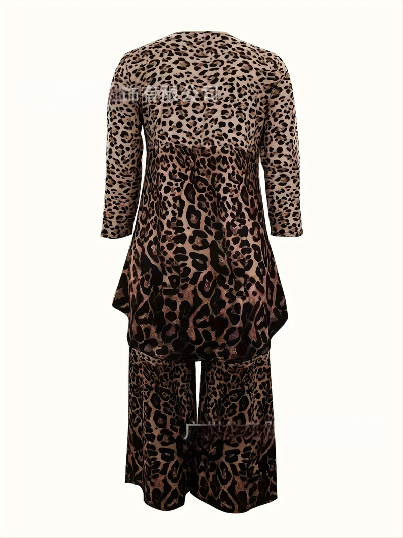 Naiste pluss-suuruses vabaaja ülikond, pluss-suuruses lühike eest ja pikk tagant asümmeetriline ümara kaelusega topp ja lahtised püksid, kaheosaline komplekt