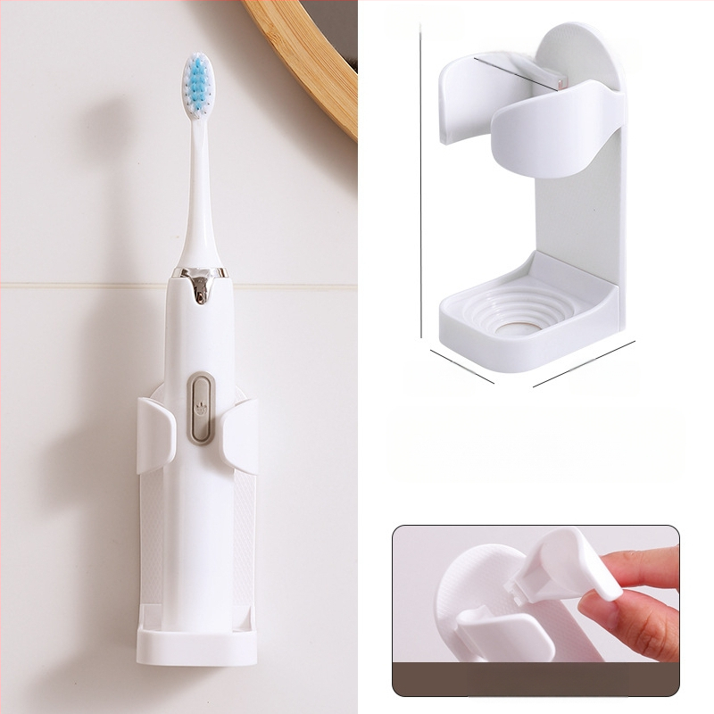 Elektrinis dantų šepetėlis laiko be perforatoriaus tvirtinamą prie sienos dantų šepetėlių pakabą, tualeto dantų šepetėlių laikymo pagrindą, dantų laikymo lentyną