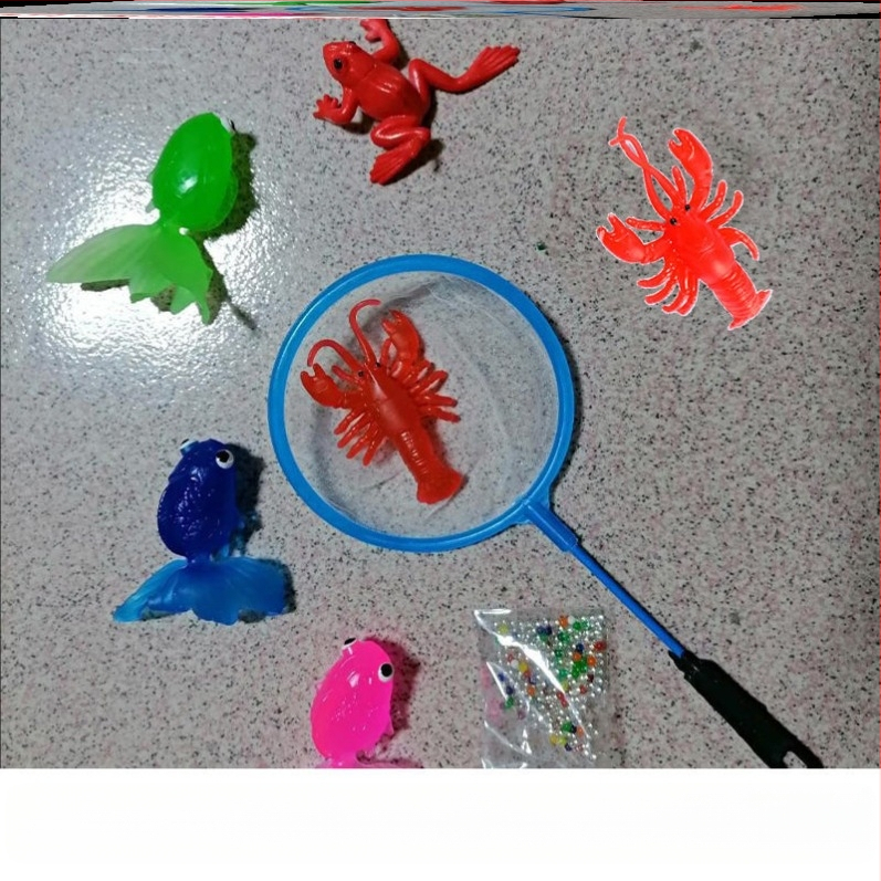 Ujuv kalamänguasi beebidele alushariduse lastele kuldkala võrgutasku silikoonist väike kala pehme kummist loom piiriülene eksport