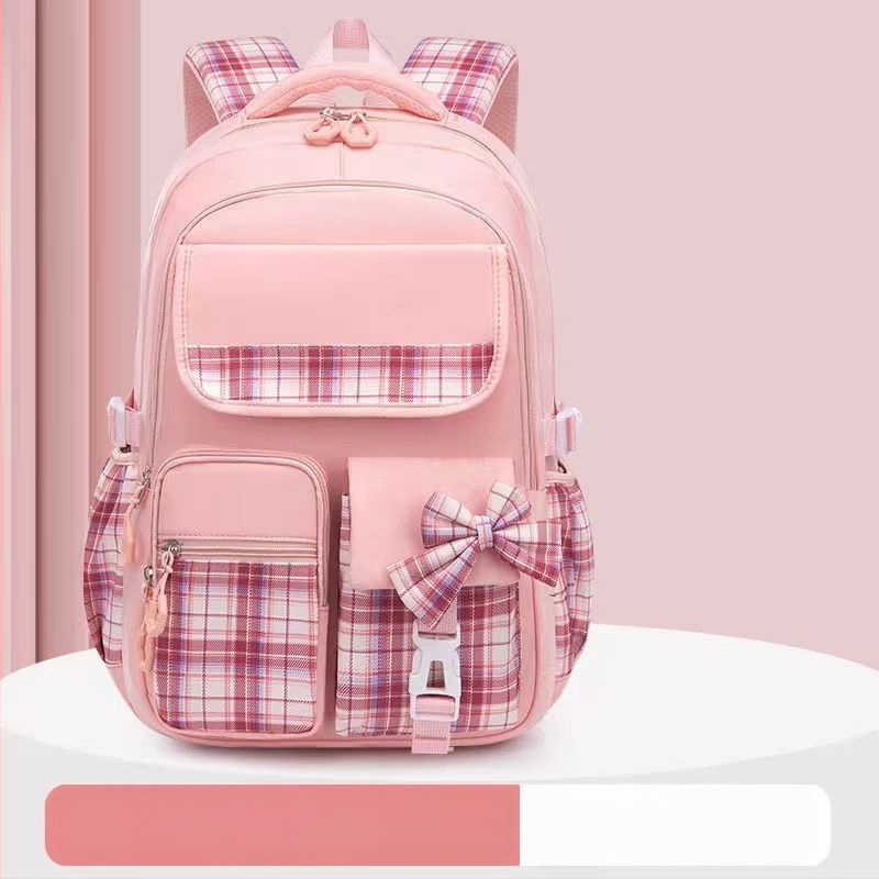 Hulgimüügis olevad algkooliõpilaste koolikotid, naismudelid, armas koomiksiga lips, suure mahutavusega, koormust vähendav seljakott, selgroogu kaitsev laste seljakott