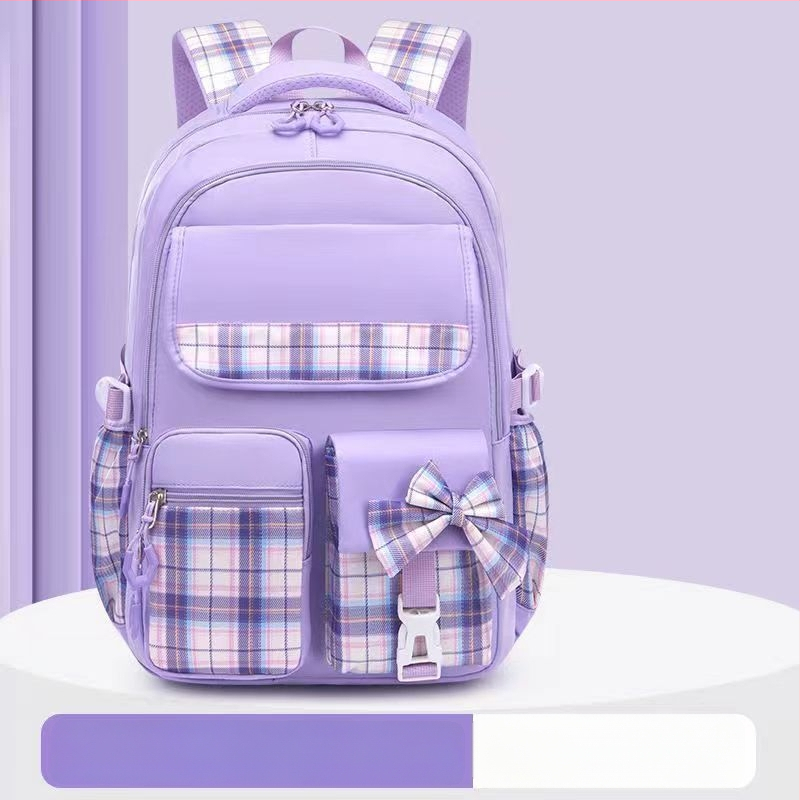 Hulgimüügis olevad algkooliõpilaste koolikotid, naismudelid, armas koomiksiga lips, suure mahutavusega, koormust vähendav seljakott, selgroogu kaitsev laste seljakott