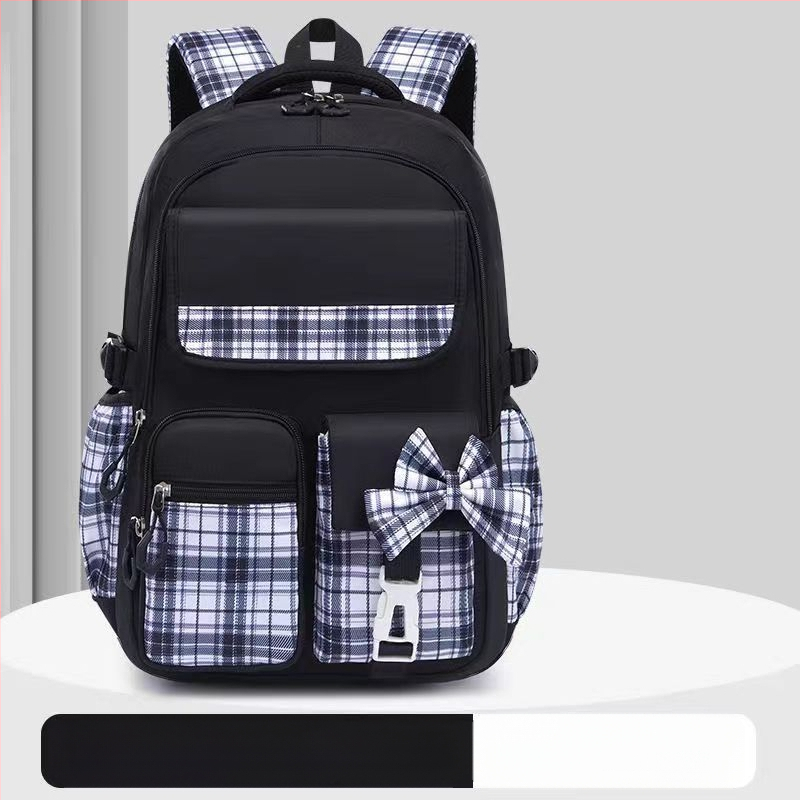 Hulgimüügis olevad algkooliõpilaste koolikotid, naismudelid, armas koomiksiga lips, suure mahutavusega, koormust vähendav seljakott, selgroogu kaitsev laste seljakott