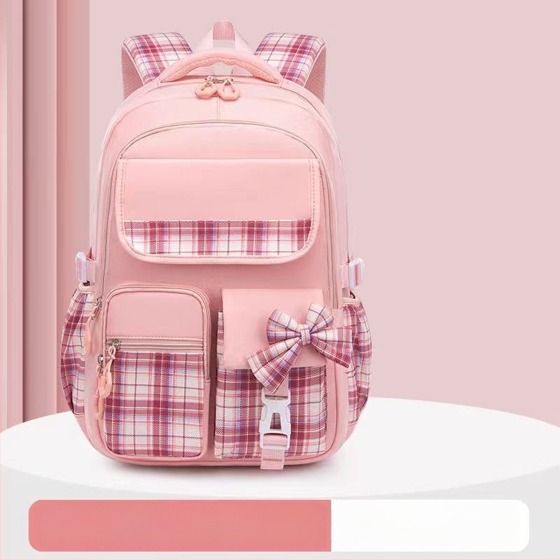 Hulgimüügis olevad algkooliõpilaste koolikotid, naismudelid, armas koomiksiga lips, suure mahutavusega, koormust vähendav seljakott, selgroogu kaitsev laste seljakott