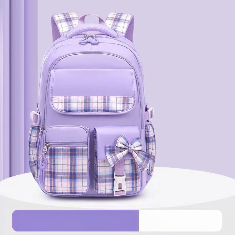 Hulgimüügis olevad algkooliõpilaste koolikotid, naismudelid, armas koomiksiga lips, suure mahutavusega, koormust vähendav seljakott, selgroogu kaitsev laste seljakott