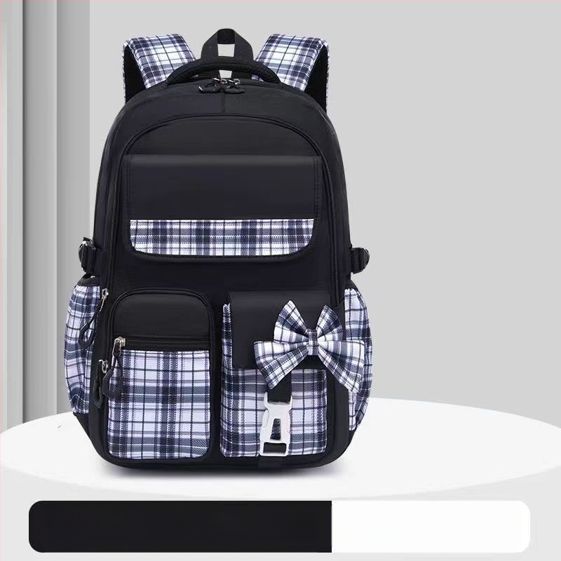 Hulgimüügis olevad algkooliõpilaste koolikotid, naismudelid, armas koomiksiga lips, suure mahutavusega, koormust vähendav seljakott, selgroogu kaitsev laste seljakott