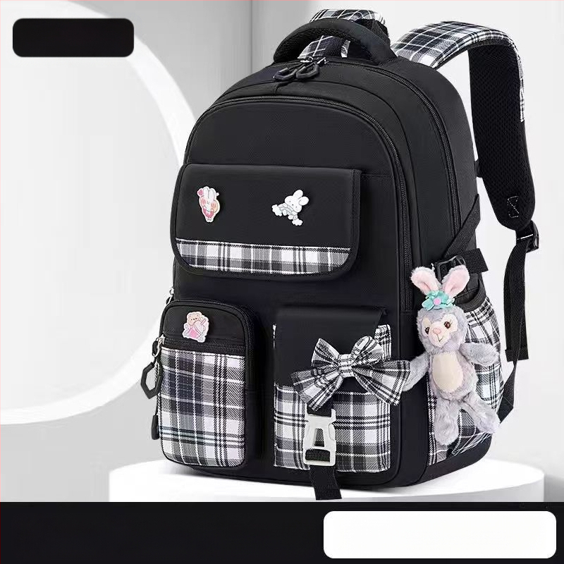 Hulgimüügis olevad algkooliõpilaste koolikotid, naismudelid, armas koomiksiga lips, suure mahutavusega, koormust vähendav seljakott, selgroogu kaitsev laste seljakott