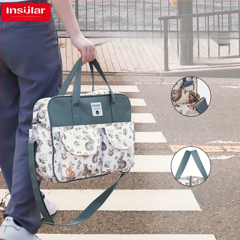 Piiriülene multifunktsionaalne õlakott emmele, veekindel ema ja imiku väljaminev kott kaasaskantav kott just-in-time ema kott hulgimüük