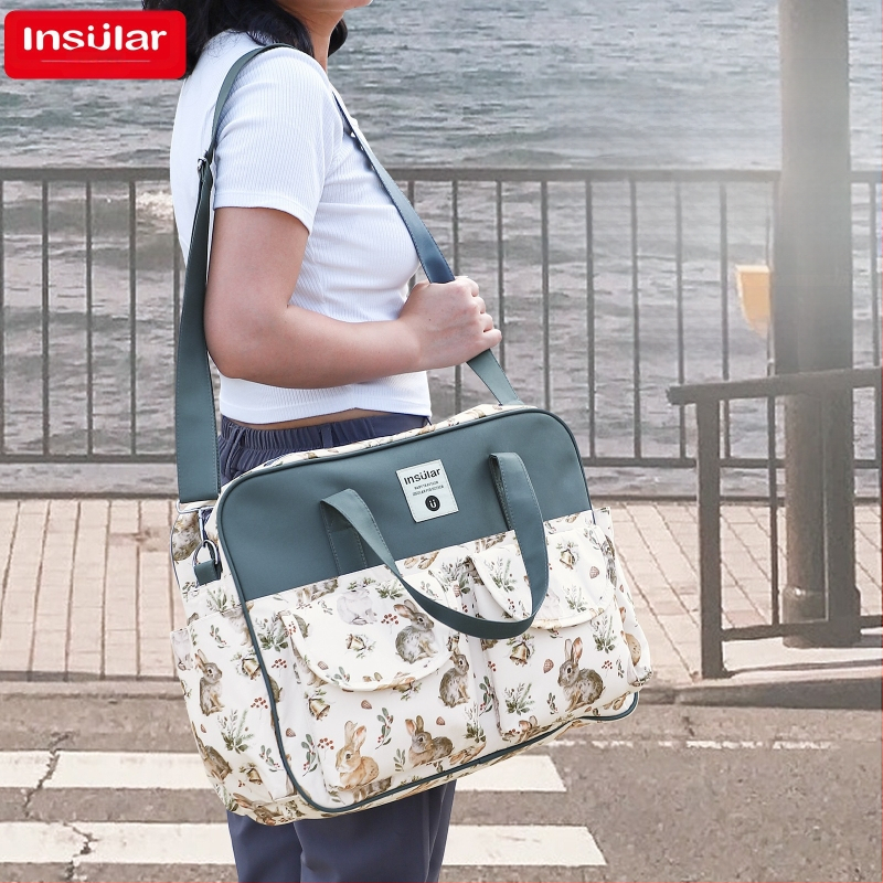 Piiriülene multifunktsionaalne õlakott emmele, veekindel ema ja imiku väljaminev kott kaasaskantav kott just-in-time ema kott hulgimüük