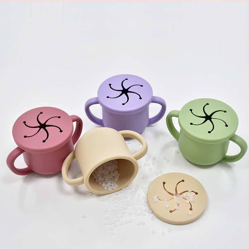 Karšto pardavimo vaikiškas silikoninis dvigubos ausies užkandžių puodelis su atidarymu, specialus mokymosi gėrimo puodelis kūdikiams ir mažiems vaikams, motinystės ir kūdikių reikmenys, kūdikio gėrimo puodelis