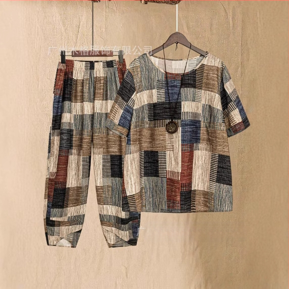 2025. aasta Euroopa ja Ameerika piiriülene moodne uus suvine geomeetrilise mustriga lühikeste varrukatega topp ja porgandipüksid