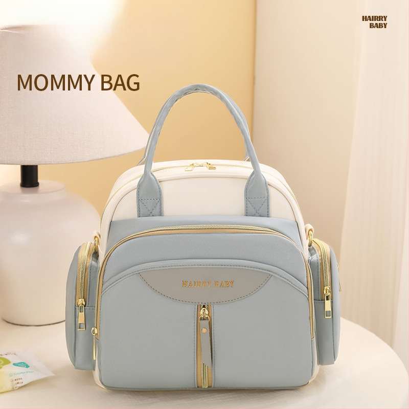 Multifunktsionaalne emmekott 2025. aasta uus suure mahutavusega seljakott, mida saab kanda risti üle keha, kott beebitarvete jaoks emale ja beebile