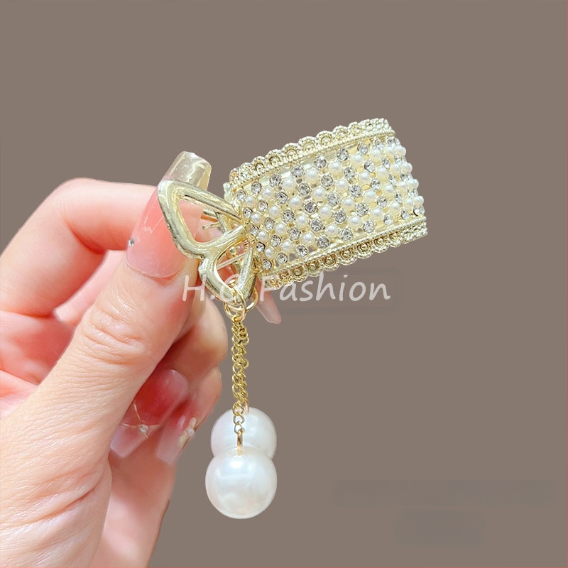 Temperament kõrge hobusesaba küünisega klamber fikseeritud artefaktiga tutiga peakate pärliga ripats juuksenõel kokkuvarisemisvastane klamber juuksenõel naistele