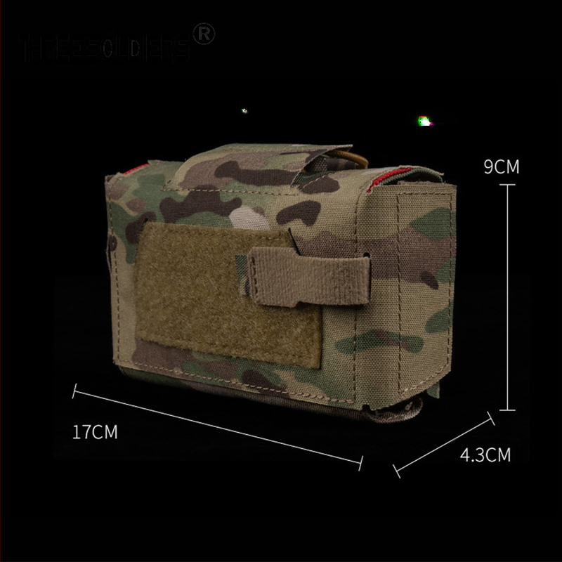 Taktikaline vest-vöö Molle, mis on varustatud väikese meditsiinilise kaasaskantava kiirvabastusega meditsiinikotiga V3