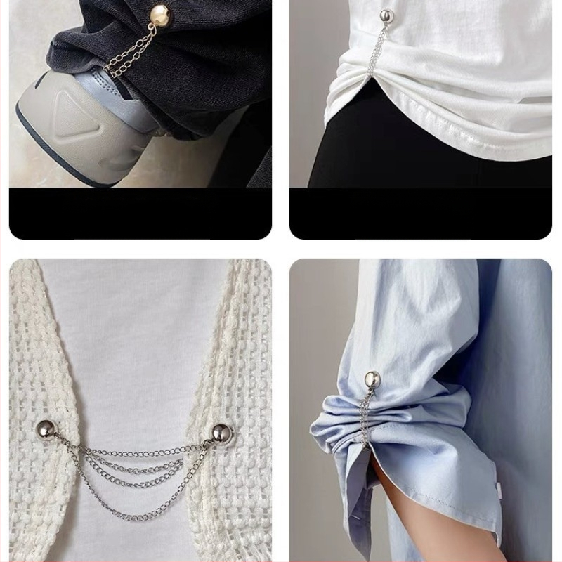 Grandinėlėje pritvirtinta magnetinė siurbimo sagtis kelnių klešnei pakeisti, rankogalių ilgiui pakeisti, trumpiems daiktams pakeisti, nuimama metalinė klešnės sagtis be vinių, be siūlių.