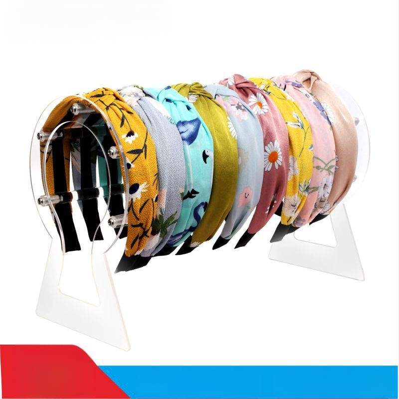 Piiriülene peapaelte vitriin Läbipaistev peakate Juuksenõeltega pearätt Juuksepaelte hoiustusriiul Akrüülpulgast juuksepaelte riiul